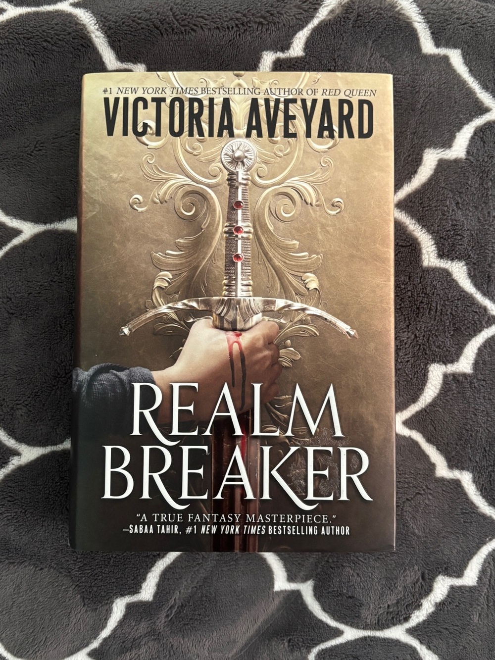 Realm Breaker by - Gold Hardcover
